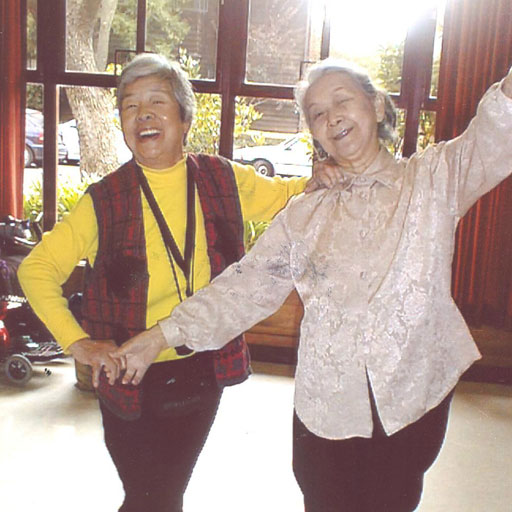 Jingwen and friend dancing.